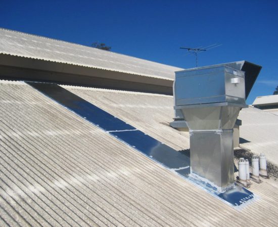 Air conditioning equipment atop a modern building - aerial/drone