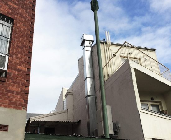 Air conditioning equipment atop a modern building - aerial/drone