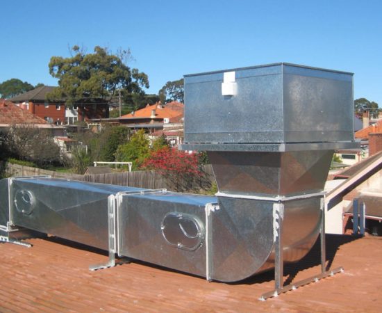 Air conditioning equipment atop a modern building - aerial/drone